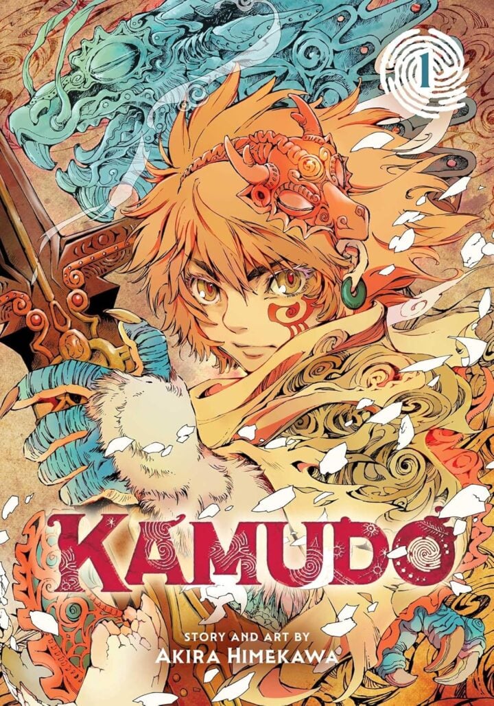 Kamudo cover. A boy with orange hair and a dragon mask holds a sword in his furry hand. He has a red tatoo under one eye. A blue dragon can be seen behind him.