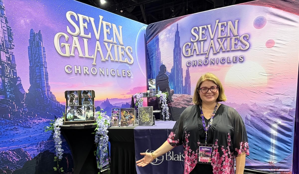 unnamed S.G. Blaise at the Lilac Grove Entertainment booth feat. The Seven Galaxies Chronicles