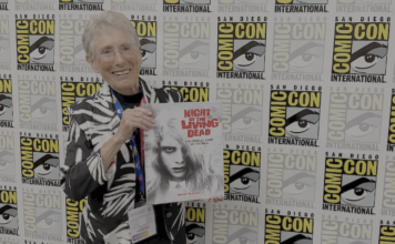 They’re coming to interview you, Barbara: JUDITH O’DEA for NIGHT OF THE LIVING DEAD: THE OFFICIAL STORY OF THE FILM Judith O'Dea at San Diego Comic-Con on Thursday, July 23rd, 2026, holding a copy of Night of the Living Dead: The Official Story of the Film. Credit: Avery Kaplan.