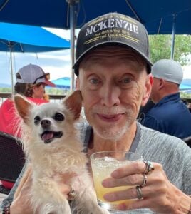 A photo of Roger McKenzie and one of his dogs, courtesy of his family