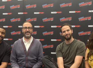 NYCC ‘26: The cast and co-creators of COMMON SIDE EFFECTS tease Season 2 (L-R) Joseph Lee Anderson, Steve Hely, Joe Bennett, and Emily Pendergast sitting at NYCC '26 smiling.